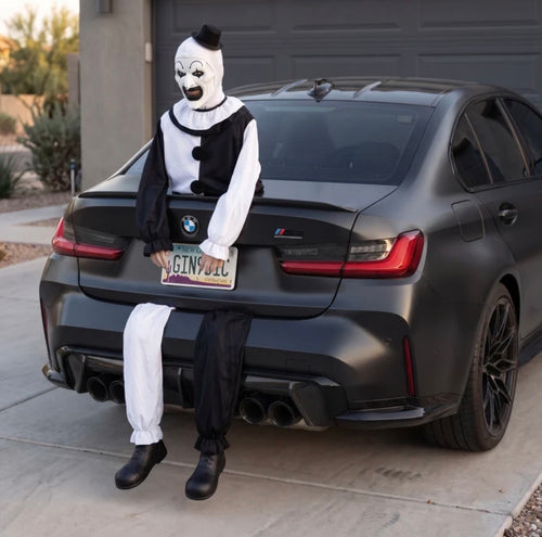 Black and white clown trunk prop