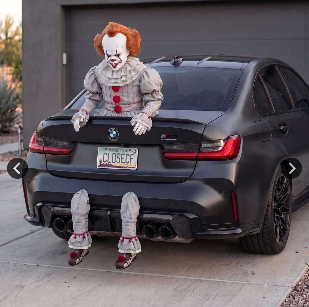 Red-haired clown trunk prop